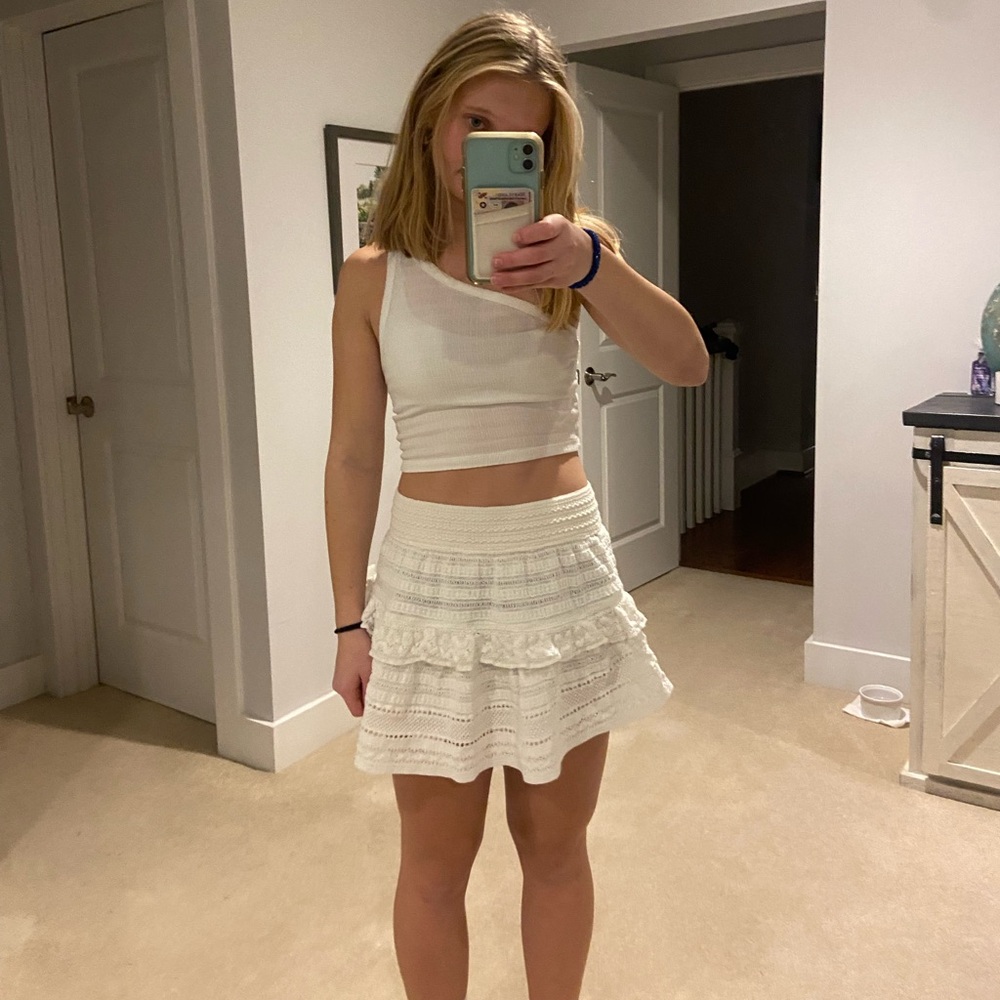 White aerie skirt with many intricate designs perfect for the summer
